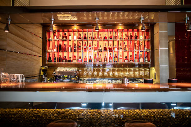 istock A bar with stools and drinks shelf in a modern restaurant 1167734038