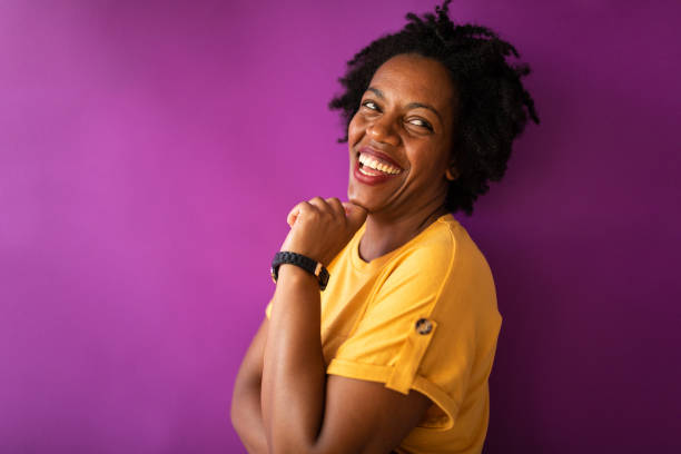 istock Beautiful Afro woman with hand on chin 1167736802