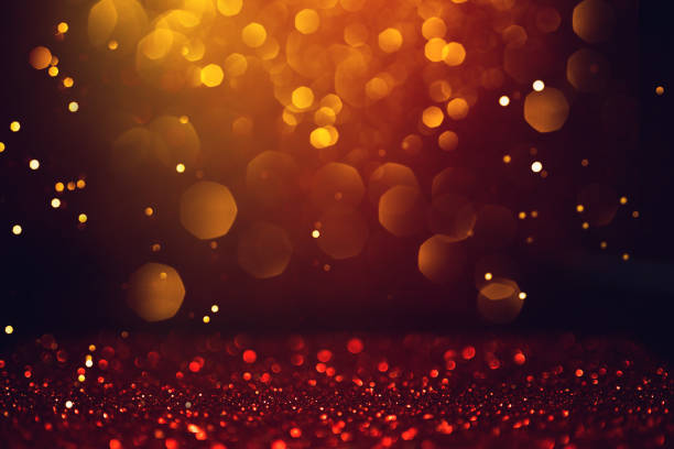 istock Golden abstract bokeh on black background. 1167737044