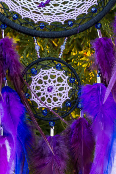 istock Handmade dream catcher with feathers threads and beads rope hanging 1167737852