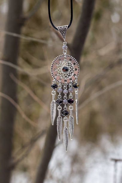 istock Handmade dream catcher with feathers threads and beads rope hanging 1167738171