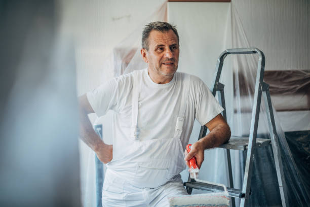 istock Portrait Of Happy Painter 1167738563