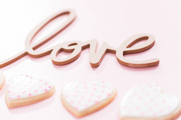 istock LOVE sign with heart shaped sugar cookies 1167739174
