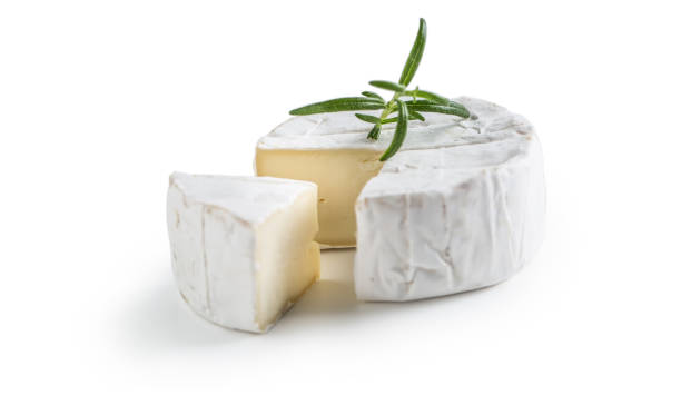 istock Camembert or brie cheese with rosemary isolated on white 1167745006