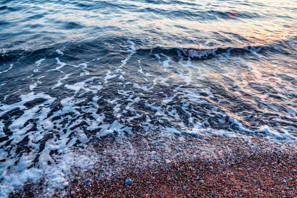 istock sea wave and pebble shore close-up, abstract natural background 1167746381