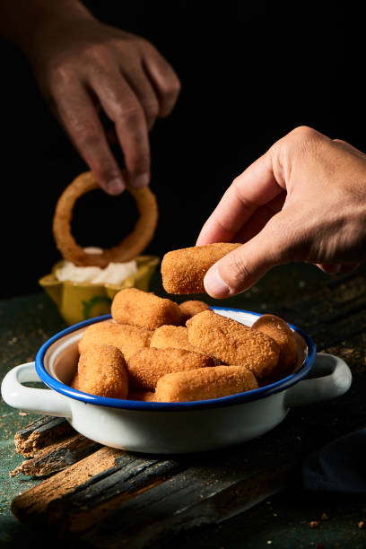 istock spanish squid rings and croquettes 1167747523