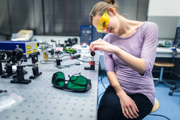 Female scientist carrying out research experiments in a quantum optics lab