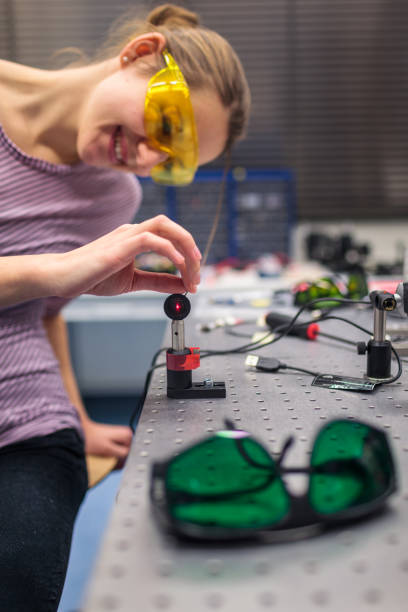 istock Female scientist carrying out research experiments in a quantum optics lab 1167749139