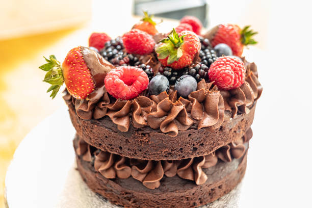istock Home made chocolate cake with berry fruit 1167750140