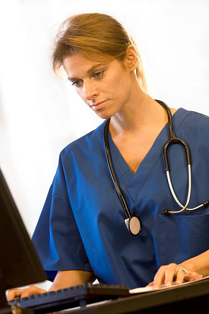 istock Pretty Female Doctor At Her Desk 116775293