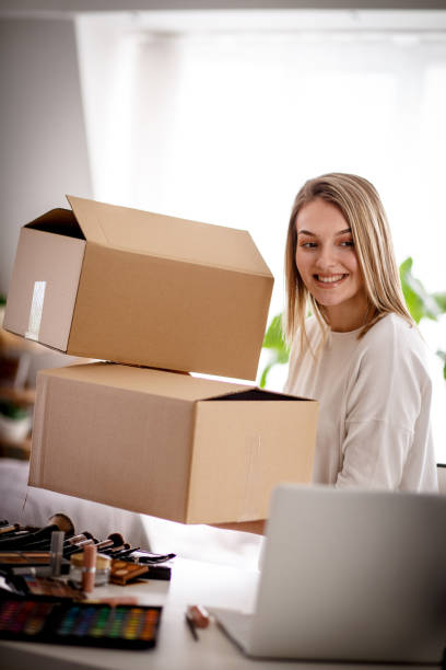 istock Happy young female vlogger doing a live stream for her internet audience 1167753156