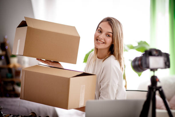 istock Smiling female influencer filming an internet video 1167753159