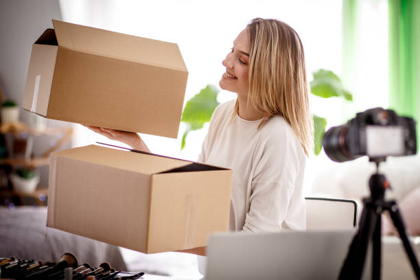 istock Confident young female vlogger filming a video for her internet audience 1167753169