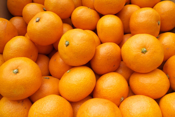 istock Fresh mandarin oranges from farm in the box 1167755603