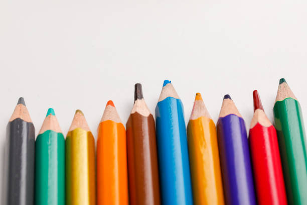 istock spectacles, Blackboard and color pencil on white background 1167758586