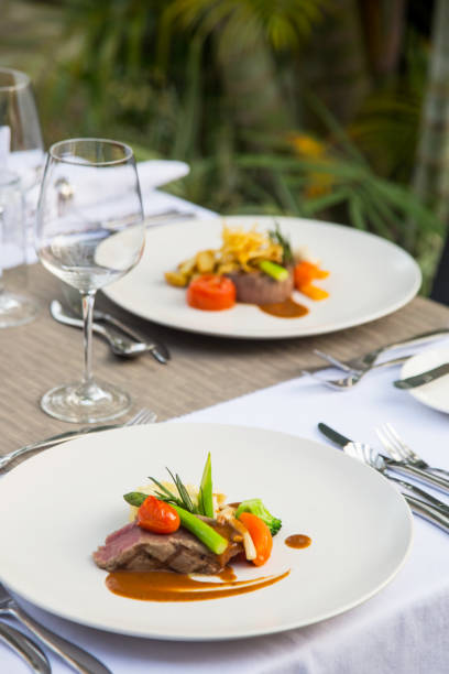 istock Beefsteak served with steamed vegetables, Exquisite dish, creative restaurant meal concept 1167758839