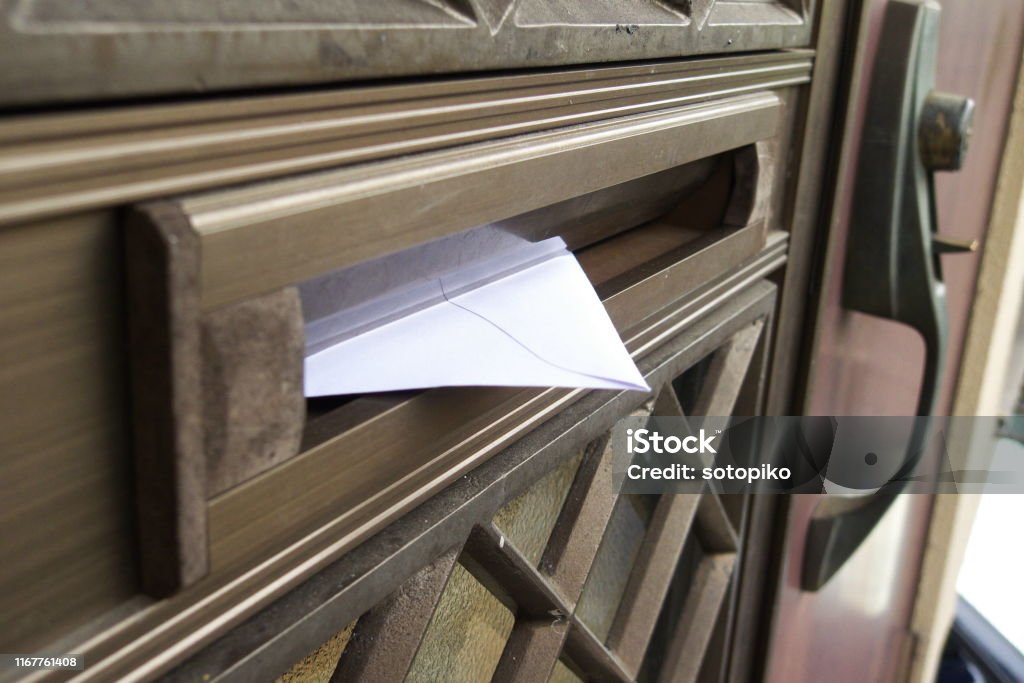 A letter in the mailbox outdoor, daytime Mail Stock Photo