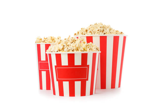 istock Striped buckets with popcorn isolated on white background 1167761464
