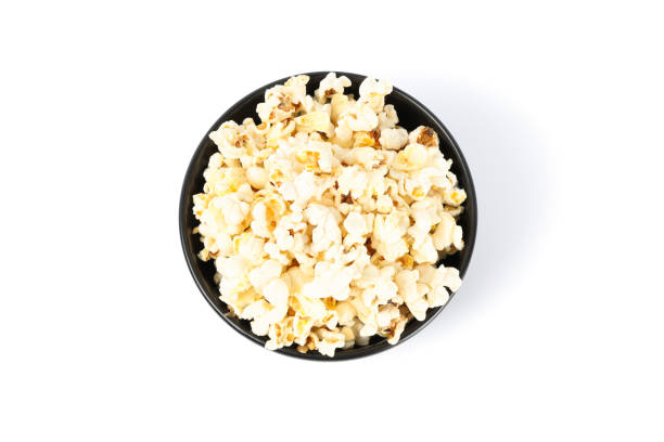 istock Black bowl with popcorn isolated on white background 1167763804