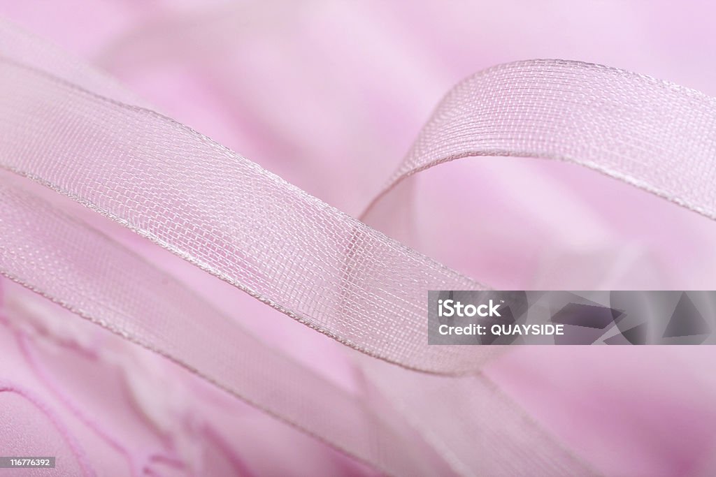 lace folds of white lace on a background of pink Art And Craft Stock Photo