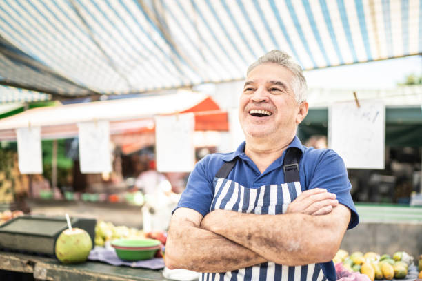 istock Senior market vendor looking away 1167763940