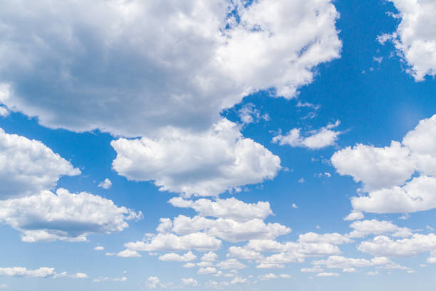 istock White fluffy clouds in the blue sky in summer 1167764088