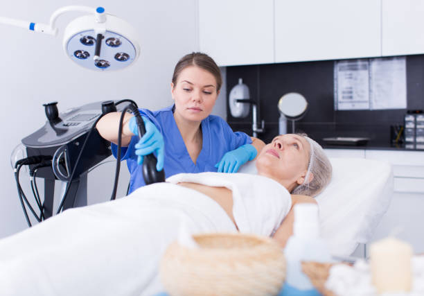 istock Beautician performing machine cosmetological procedure 1167765221