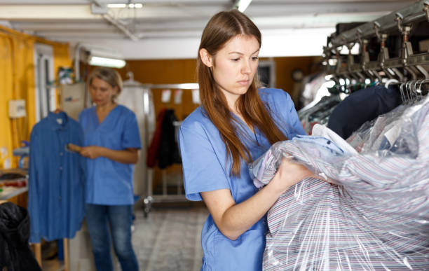 istock Two women working at dry-cleaning salon 1167765322