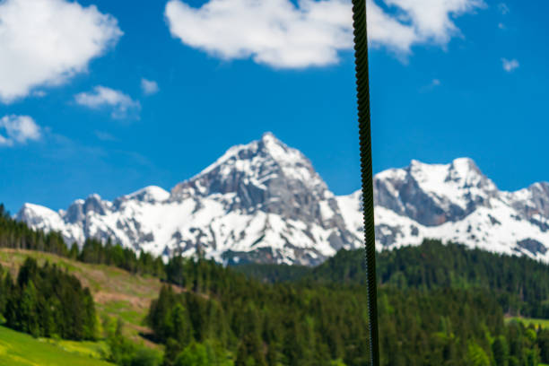Rope of a cableway in front of a beautiful mountain landscape