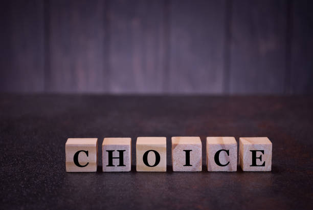 istock The word choice on wooden cubes, on a dark background 1167769452