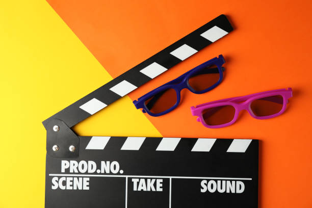 istock 3d glasses and clapperboard on two tone background, space for text 1167770996