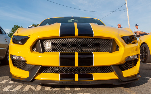 Dartmouth, Nova Scotia, Canada - July 18, 2019 : Menacing front view of a 2018 Ford Shelby Mustang weekly summer A&W Cruise-In at Woodside ferry terminal parking lot. Would be intimidating to see in your rear view mirror.