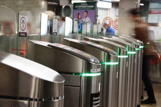istock People going through the turnstile in the subway. Passengers subway 1167773390