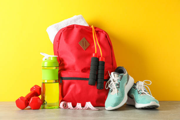 istock Loss weight accessories on grey table against color background 1167777873