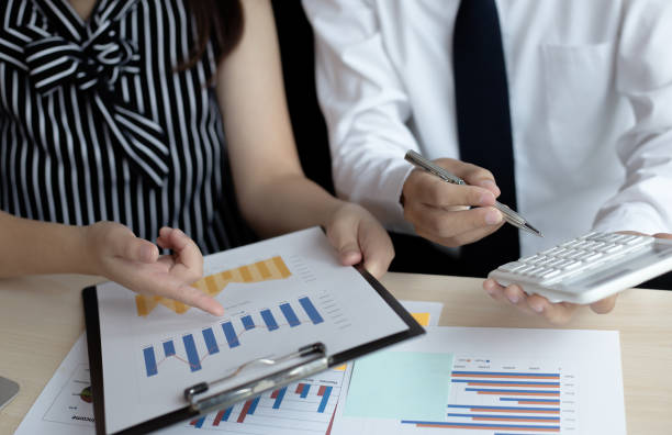 istock Financial and investment planning, Head of Marketing is analyzing data from the summary graph statistics for executives, business meetings. 1167778906