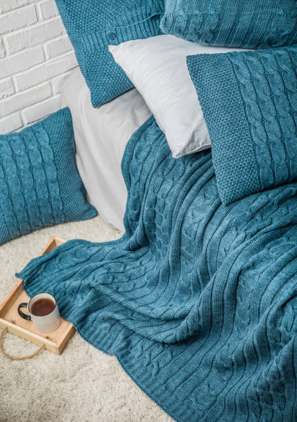 istock bedroom interior warm plaid pillows textile color 1167780820
