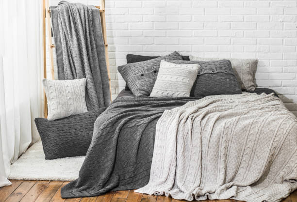 istock bedroom interior warm plaid pillows textile color 1167780835