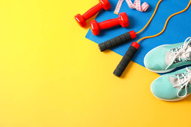 istock Flat lay composition with healthy lifestyle accessories on color background 1167781053