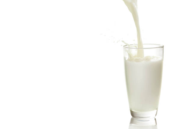 glass of milk stock photo