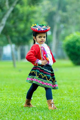 Beautiful girl dressed as Ãusta, typical costume of Cusco in Peru