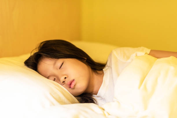 istock Asian little girl is sleeping 1167782648
