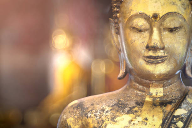 istock Ancient golden buddha state at Wat Suthat ,Bangkok ,Thailand 1167783428