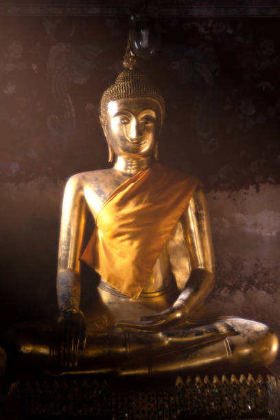 istock Ancient golden buddha state at Wat Suthat ,Bangkok ,Thailand 1167784176