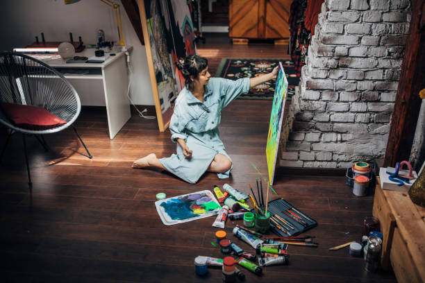 istock Beautiful artist working in her studio 1167784555