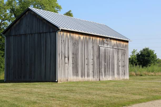 istock Side View of Old Wood Barn 1167784611