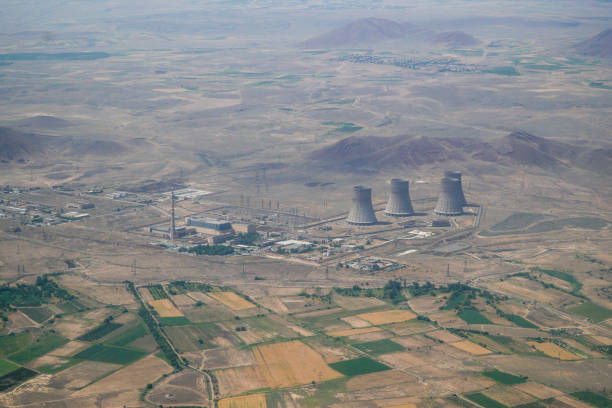 High Angle View Of Power Plant With Agricultural Fields Around Photo taken in Yerevan, Armenia nuclear energy stock pictures, royalty-free photos & images