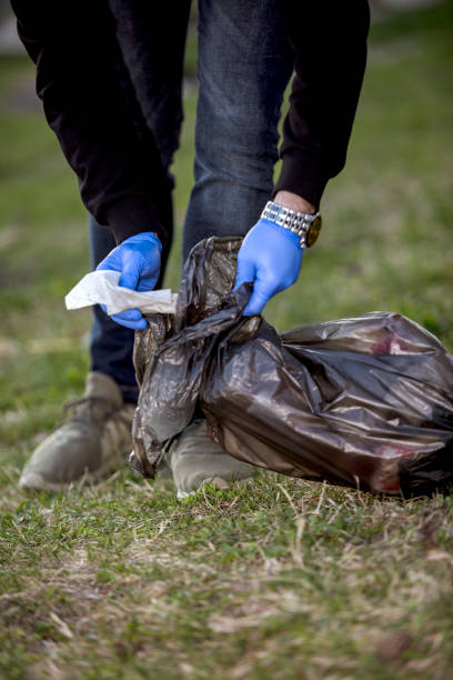 istock A man from the team collects trash 1167791425