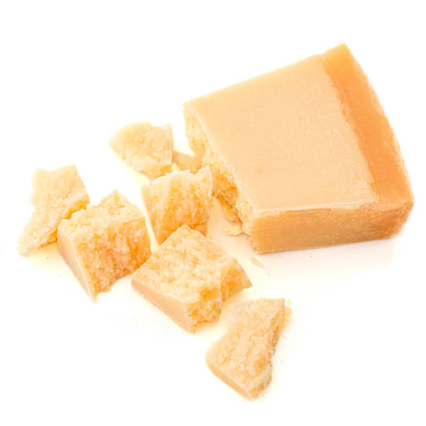 istock Pieces of parmesan cheese isolated on white background 1167791800