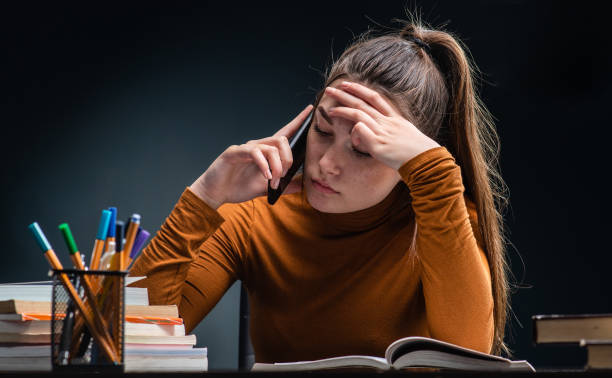 istock Young beauty but stressed student girl studying for hard exam 1167791891