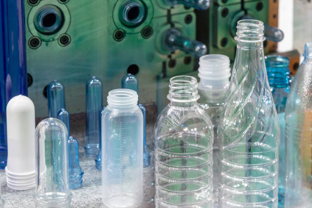 istock The PET bottles and the preform shape with the injection mould background. 1167794278